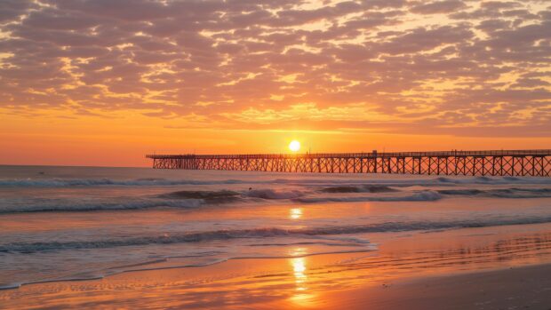 Majestic beach sunset 4K background with a wooden pier extending into the ocean.
