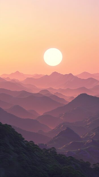 Mountain cute sunset with a clear view of the sun dipping below the peaks.