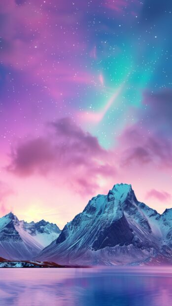Northern Lights above a rugged mountain range.