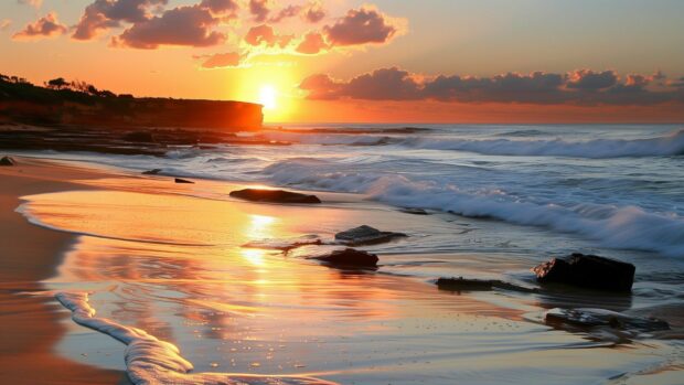 Quiet beach with smooth rocks and gentle waves, Sunset Desktop Wallpaper HD.