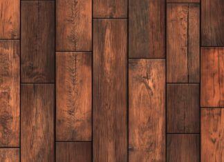 Wood desktop background QHD 2K with a seamless wooden plank floor pattern with natural wood tones.