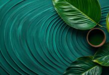 A refined green wallpaper featuring a gentle, concentric circle pattern that adds elegance through simplicity.