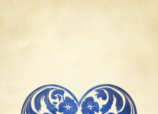 A single cute blue heart with intricate floral designs etched into it.
