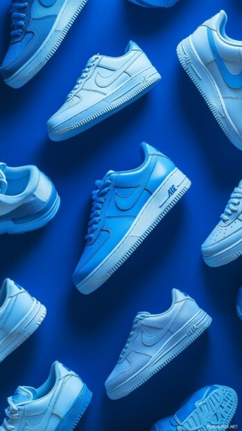 Nike sneakers in various shades of blue.