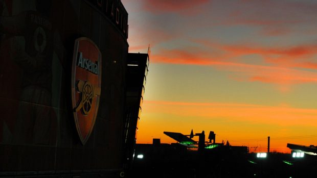 Arsenal Stadium at night.