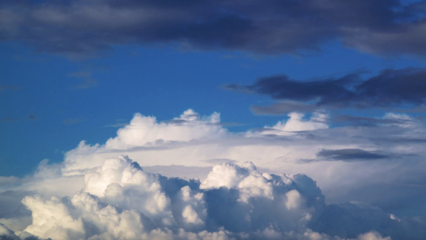 Clouds moving over blue sky background change day to night 4k images 620x349