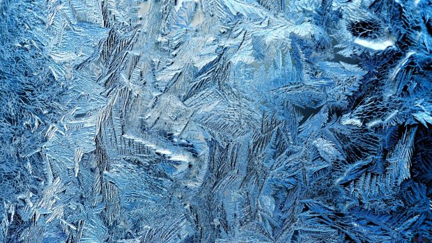 Frost patterns on glass wallpaper hd.