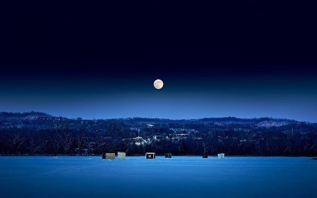 Full moon night sky ice constructions.