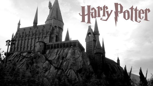 Harry Potter Wallpaper with logo and Hogwarts.
