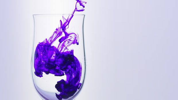 Images purple ink in a glass.