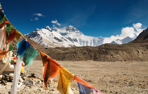 Buddhist prayer flags and mount Everest.