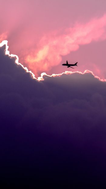 Plane Above Sunset Clouds iPhone 6 Plus HD Wallpaper.