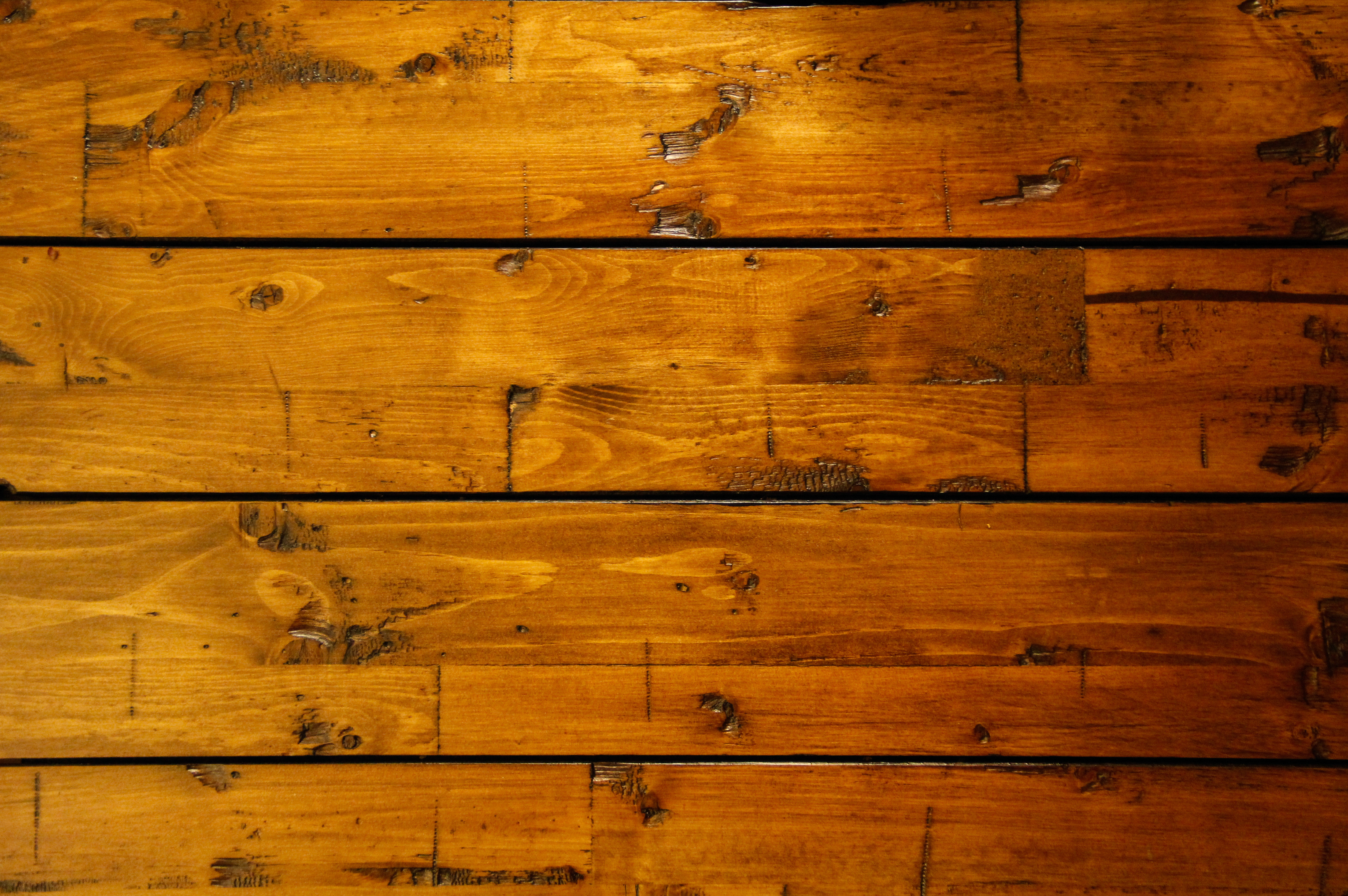 Rough wood texture plank teak table grunge red grain wallpaper.