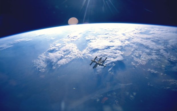 Space station from earth desktop wallpaper.