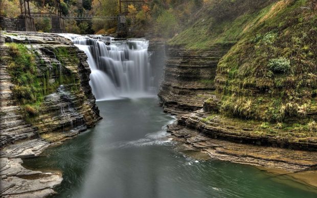 Water carved rocks guarding the waterfall images 1920x1200.