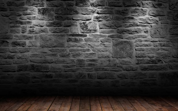 Brick wall and wood floor desktop background.