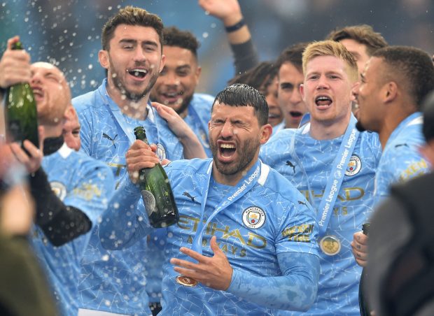 Aguero celebrated with champagne after helping Man City to their fifth premier League crown.