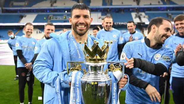 Aguero uplifting the Cup Premier League Champions 2021.