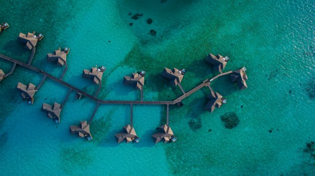 Cool 4k Wallpaper Aerial photography of resort villa on water.