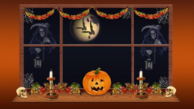 Eerie Halloween window display with pumpkin, skulls, skeletons, bats, candles, spiderwebs, and autumn leaves against a dark night sky.