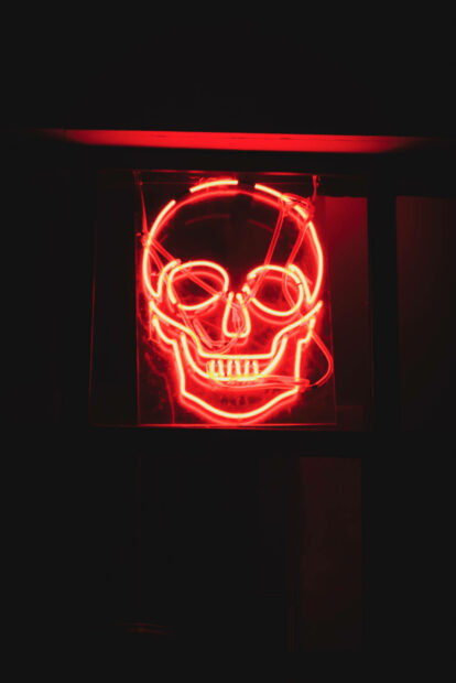 Illuminate Your World with a Neon Skull Wallpaper.
