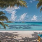 Dreamy 4K wallpaper of a hammock between two palm trees overlooking a tropical paradise