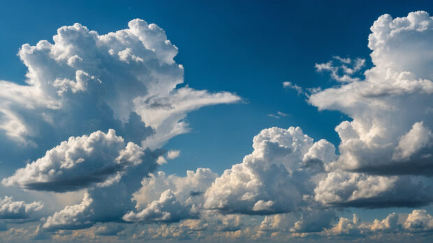 White clouds and clear blue sky in the summer.